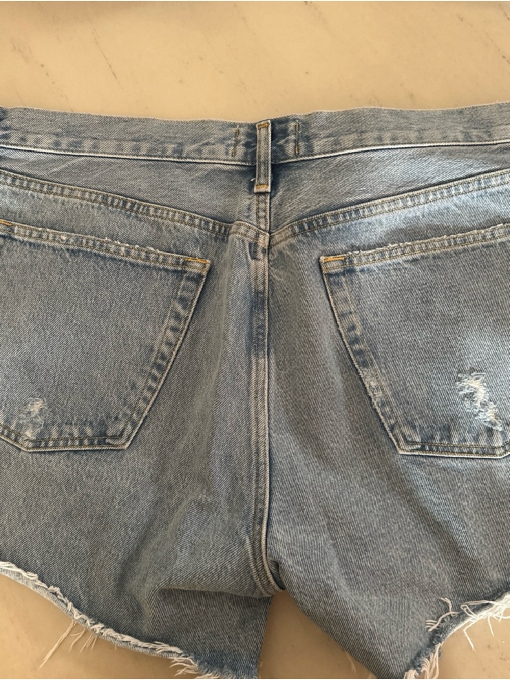 Agolde Light Blue Denim Shorts with Yellow Stitching